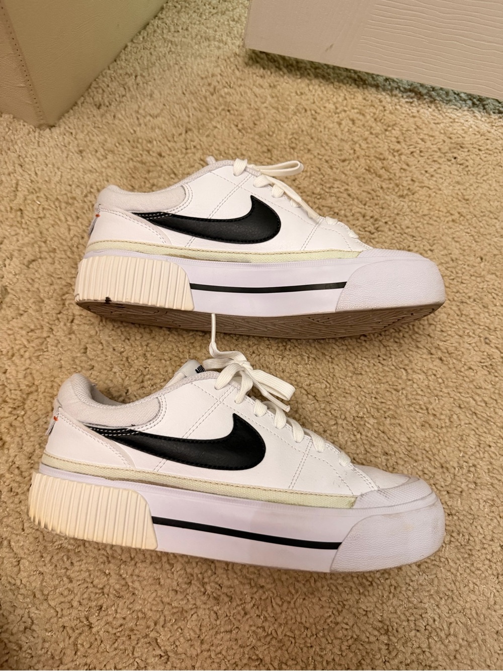 Nike Women’s White Platform Sneakers with Black Swoosh and Cream Trim